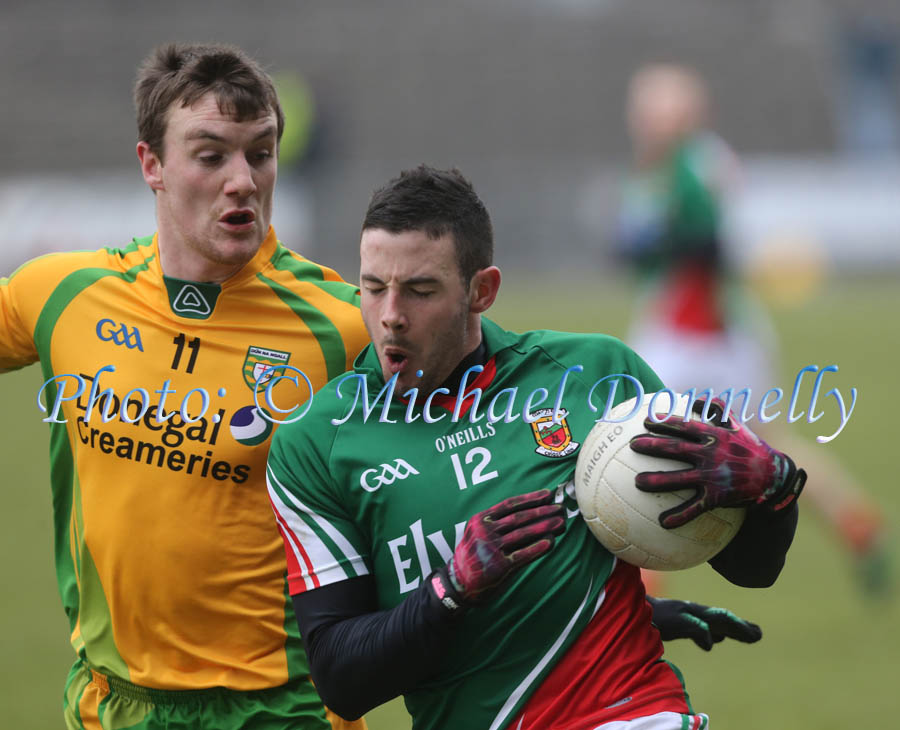 Cathal Carolan v Leo McLoone (Donegal) at the 2013 Allianz Football League Div 1 Round 6 in Elverys MacHale Park Castlebar. Photo: © Michael Donnelly