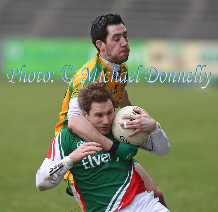 Michael Conroy gets a "Headlock"" from Donegal's Mark McHugh in the 2013 Allianz Football League Div 1 Round 6 in Elverys MacHale Park Castlebar. Photo: © Michael Donnelly