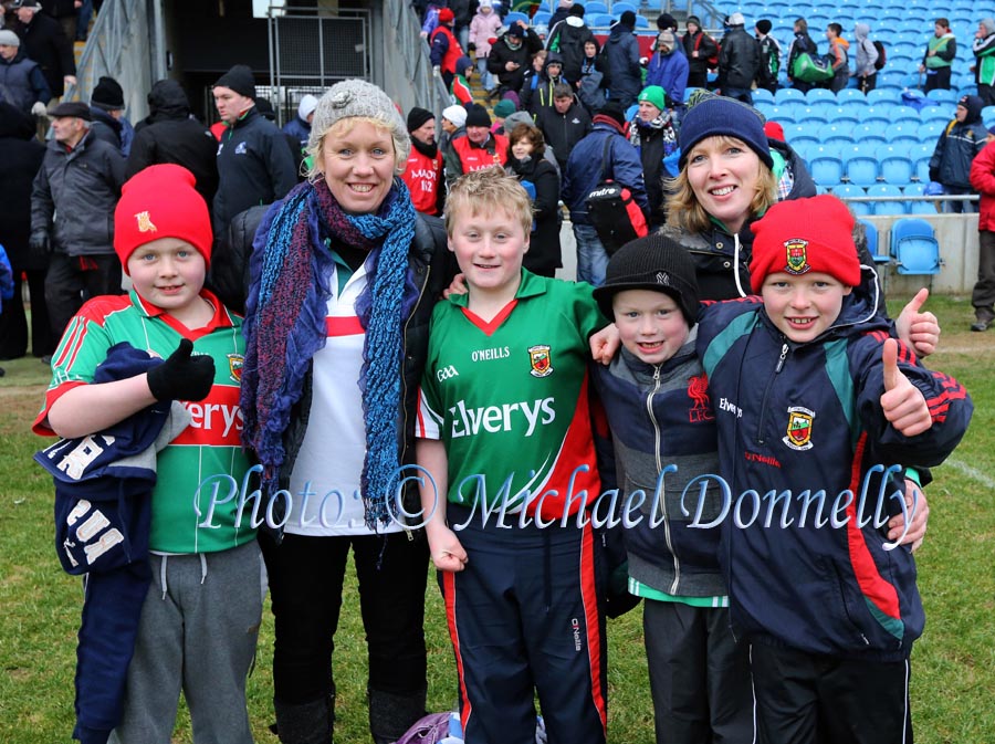Hughes and McDonnell family members Killala, celebrate Mayo's win over Donegal in the 2013 Allianz Football League Div 1 Round 6 in Elverys MacHale Park Castlebar. Included in photo are Marty Mary and Cormac Hughes and Callum Annie and Aaron McDonnell Photo: © Michael Donnelly