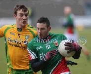 Cathal Carolan v Leo McLoone (Donegal) at the 2013 Allianz Football League Div 1 Round 6 in Elverys MacHale Park Castlebar. Photo: © Michael Donnelly