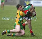 Patrick McBrearty  pulls down Tom Cunniffe in the 2013 Allianz Football League Div 1 Round 6 in Elverys MacHale Park Castlebar. Photo: © Michael Donnelly