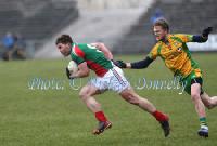 Wait for me- Seamus O'Shea shows a clean pair of heels to Donegal's Ross Wherity in the 2013 Allianz Football League Div 1 Round 6 in Elverys MacHale Park Castlebar. Photo: © Michael Donnelly