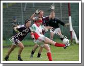 Fiona McHale scores despite pressurre at the Connacht Ladies Football TG4 Senior Championship final in Tuam Photo:  Michael Donnelly