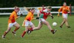 Cora Staunton Carnacon is pursued by Clare O'Hara and Ann Nolan Castlebar Mitchels in the final of the Aisling McGing Tournament in Clogher. Photo Michael Donnelly