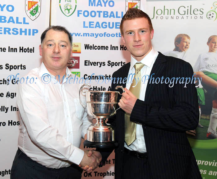  James Moran, Urlaur Utd accepts the Tonra Cup (sponsored by Killeen Sports Grounds) (Division 1 Cup) from Padraig McHale Chairman Mayo League at the Mayo League Dinner and Presentation of awards in the Welcome Inn Hotel Castlebar. Photo: © Michael Donnelly Photography
