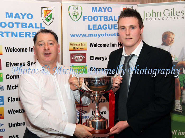  Padraig McHale Chairman Mayo League presents Gary Cunningham (Westport Utd ) with the FCS Cup. Photo: © Michael Donnelly Photography