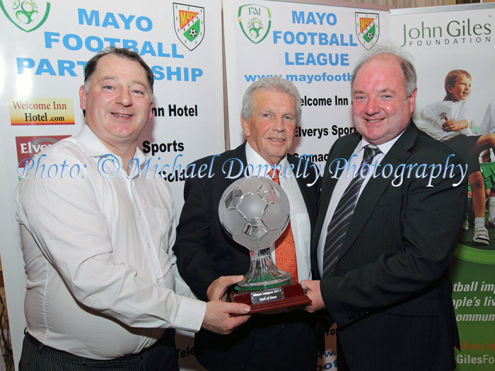 Padraic McHale, Chairman Mayo League and John Giles Guest of Honour present the Mayo League Hall of Fame  2011 Award to PJ Duffy Conn Rangers, at the Mayo League Dinner and Presentation of awards in the Welcome Inn Hotel Castlebar. Photo: © Michael Donnelly Photography