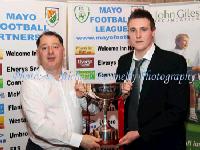  Padraig McHale Chairman Mayo League presents Gary Cunningham (Westport Utd ) with the FCS Cup. Photo: © Michael Donnelly Photography