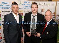  Gary Cunningham of Westport United  is  presented with Goalkeeper of the Year  Award by Pat Quigley, Sponsor; included in photo is Ciaran Kelly, Mayo native who made history by saving FAI Cup penalties for Sligo Rovers. Photo: © Michael Donnelly Photography