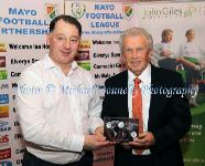  Padraic McHale, Chairman Mayo League makes a presentation to Special Guest John Giles at the Mayo League Dinner and Presentation of awards in the Welcome Inn Hotel Castlebar. Photo: © Michael Donnelly Photography