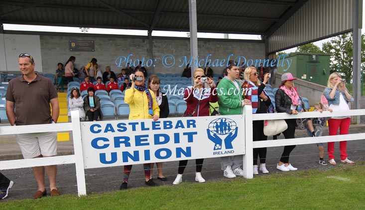 Supporters capture the action  in the West Ham who defeated Watford FC team  to win the Mayo International Cup final at Milebush Park. Photo: © Michael Donnelly Photography