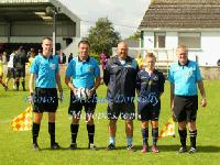 Anthony Scully captain U-13s and manager Mark Phillips of West Ham pictured with match officials in the West Ham v Watford FC game at Ballyglass in Mayo International Cup. Photo: © Michael Donnelly Photography