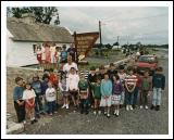 Steve Staunton, pictured with local children at Mary Morans Cottage during his visit to Ballintubber some years ago