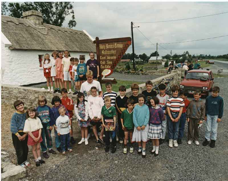 Steve Staunton, pictured with local children at Mary Morans Cottage during his visit to Ballintubber some years ago