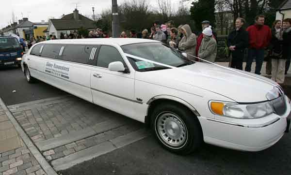 It is not everyday that a Stretch Limo  comes down McHale Road, this one is from Abbey Limousines, a new service that is available from Mick Sweeney Ballyheane, pictured at the Castlebar St Patrick's Day Parade. Photo Michael Donnelly 
 