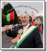 Bob Shannon, leader of the Quaker City String Band in jovial form at St Patrick's Day Parade in Kiltimagh. Photo:  Michael Donnelly