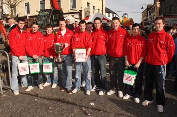 Students of St Colmans College pictured with Shane Nally captain of the College Gaelic Football holding the Connacht Colleges Senior Cup as they collect funds for the College Fotball Pitch fund at the Claremorris St Patrick's Day Parade. Photo:  Michael Donnelly