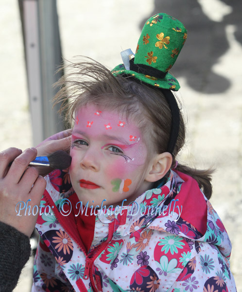 Ruby Borman, Claremorris gets the Finishing touches to her face painting at the Claremorris St Patricks Day Parade. Photo: © Michael Donnelly