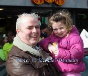 A day is never too cold for Icecream- Richard and Ella Gitzgerald, Claremorris at the Claremorris St Patricks Day Parade. Photo: © Michael Donnelly
