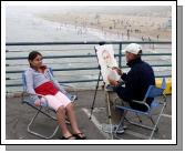 Artist at work on Santa Monica Pier, California. Photo Michael Donnelly