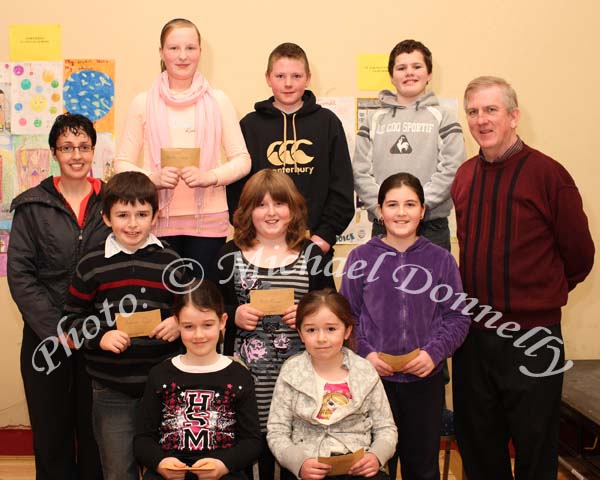 Winners in the Mayo Abbey National School section of the St Colmans (Claremorris) Credit Union Poster Competition, held in the Dalton Inn Hotel, Claremorris, front from left: Category A : Aoife Brennan, 1st; Jennifer Ruane, 2nd; Middle Row:  Category B:, Sylvester Ruane 1st; Niamh Mannion, 2nd; Jessica Scahill, 3rd; At back Category C: Martha Solan, 1st; Alan Walsh, 2nd and James Gilmore, 3rd ; Included in photo are Sinead Scahill, Chairperson Parents Association and Seamus Connaughton, Claremorris Credit Union. Photo Michael Donnelly 