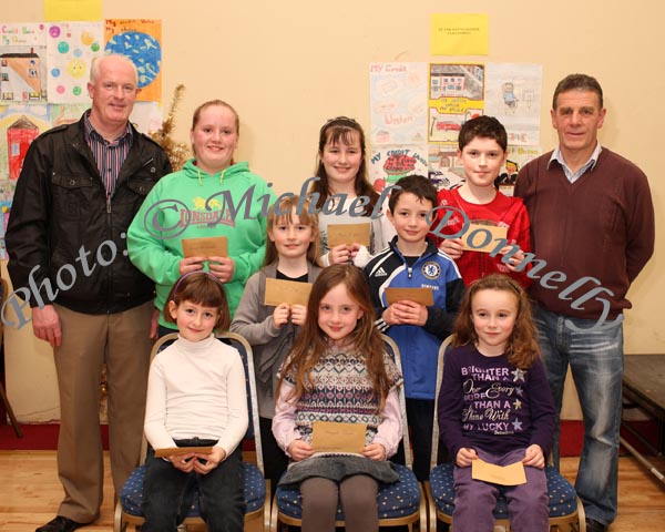 Winners in the Irishtown National School section of the St Colmans (Claremorris) Credit Union Poster Competition, held in the Dalton Inn Hotel, Claremorris, front from left: Category A- Alice O'Toole, 1st; Abbiegayle Ronayne, 2nd; Aoife Meehan, 3rd; Middle row -Category B: Lianne Daly, 2nd;Jason Huane, 3rd; - At back Category C;  Rachel McLoughlin, 1st Niamh E Huane, 2nd; and Francis Griffin, 3rd  Missing from photo was  Shauna Ryan, 1st Cat, included in photo are Liam Griffin Chairman Board of Management and  John Timothy, Claremorris Credit Union; Photo Michael Donnelly 