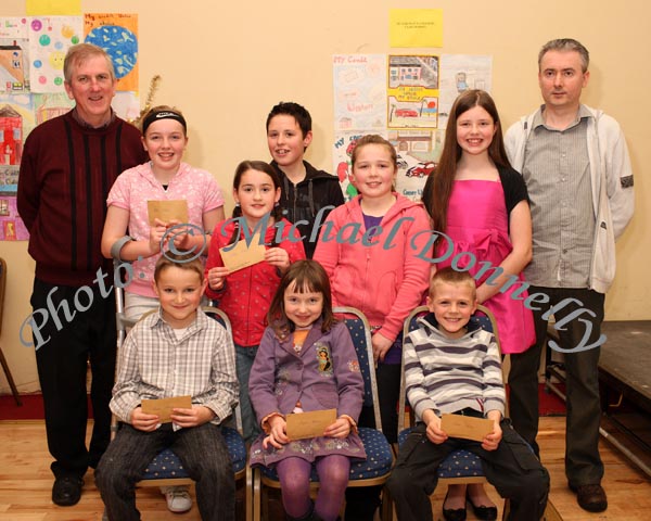 Winners in the Gortskehy National School section of the St Colmans (Claremorris) Credit Union Poster Competition, held in the Dalton Inn Hotel, Claremorris, front from left: Category A- Jamie Hession, 1st; Lorna Hession, 2nd; Adam Jepsen, 3rd; middle row Category B: Nicola Hession 1st; Mollie Higgins, 2nd; Amy Frizzell (missing), 3rd;  At back Category C: Ellen Higgins, 1st; Lee Burns, 2nd; Antonia Burns, 3rd; included in photo Seamus Conaughton, Claremorris Credit Union and Padraig Beirne, (teacher). Photo Michael Donnelly 