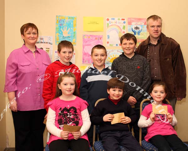 Winners in the Facefield National School section of the St Colmans (Claremorris) Credit Union Poster Competition held in the Dalton Inn Hotel, Claremorris, front from left: Category A: Sarah Commons, 1st; James Finn, 2nd; Aisling Commons, 3rd; At back Category C: Brian Murphy, 1st; Ray O'Donnell, 2nd and Damien Murphy, 3rd ; Included in photo are and Martina Gormley, Education Committee Claremorris Credit Union, and Noel Commons )teacher).  Missing were Category B winners - Sean Joyce 1st; Conor Jordan, 2nd; and Jason Henry, 3rd. Photo Michael Donnelly 
