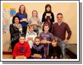 Winners in the Lehinch National School section of the St Colmans (Claremorris) Credit Union Poster Competition, held in the Dalton Inn Hotel, Claremorris, front from left: Category A- Mark Kelly 1st; Caoimhe Hughes, 2nd; Niamh Cassidy, 3rd; middle row Category B: Harry Delaney, 1st; Megan McDermott 2nd; Missing was Kayleen Coen, 3rd;  At back: Category C: Louise Delaney, 1st; Rebecca McDermott, 2nd; and Hannah Coleman, 3rd; Included in photo are Catherine Owens, teacher and John Timothy, Claremorris Credit Union. Photo Michael Donnelly 