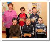 Winners in the Claremorris Boys National School section of the St Colmans (Claremorris) Credit Union Poster Competition, held in the Dalton Inn Hotel, Claremorris, at front Winners Category B: Ruairi Merrick, 1st; Rory Lavery, 2nd; and Stephen Owens, 3rd; At back Martina Gormley, Claremorris Credit Union; Mickey Higgins, 2nd and Jamie Tierney 3rd Category C (Missing was David Gilmore 1st). Photo:  Michael Donnelly