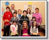 Winners in the Ballindine National School section of the St Colmans (Claremorris) Credit Union Poster Competition, held in the Dalton Inn Hotel, Claremorris, front from left: Category A- Gemma Garvey, 1st; Alannah Gallagher, 2nd; Karina Moran, 3rd; middle row Category B: Aiden Macken, 1st;James Corless, 2nd; Alice Rattigan, 3rd; At back Category C: Niall Monaghan, 1st; Jack Birdthistle, 2nd; and Laura Corless, 3rd; included in photo are Martin O'Brien (teacher) and Martina Gormley  Claremorris Credit Union . Photo Michael Donnelly 