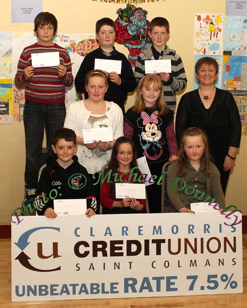 Winners of the Ballindine NS section of the St Colman's (Claremorris) Credit Union Poster Competition 2010, front from left Category A- Jack Trench, 1st; Shannen Higgins, 2nd; and Aine Mangan 3rd; Middle row Category B: Ava Trench, 2nd and Stacey Prendergast, 3rd; At back, ; DAmien Floss Jones, 1st; James Corless, 2nd, Kieran Fahey, 3rd and Martina Gormley, Claremorris Credit Union. Photo:Michael Donnelly