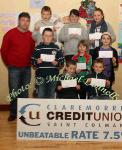 Winners of the Taugheen NS section of the St Colman's (Claremorris) Credit Union Poster Competition 2010, front from left Category A- Dylan Morris, 1st; Jack Sheridan, 2nd;  Middle row Category B: David Macken, 1st; Hazel O'Connor Smyth, 2nd and  Orla Brennan, 3rd; At back, Sean Moran, Claremorris Credit Union ; Alan McCormack, 1st Category C; Kelly Monaghan, 2nd,  and Noelle Burke, 3rd; . Photo:Michael Donnelly
