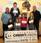 Winners of the  Gaelscoil Uileog De Burca NS section of the St Colman's (Claremorris) Credit Union Poster Competition 2010, front from left Category A- Briona Nic Dhiarmada, 1st; Alanah Nic Donnacha, 2nd;  and in Category B, Briona Finnerty, 2nd and Orla Flanagan 3rd ; At back ; Luke O'Malley, Claremorris Credit Union, Culan Higgins, 1st; and Bernyce Kyra Bormana 2nd, in Category C and Tomas Ruane, Claremorris Credit Union. Photo:Michael Donnelly