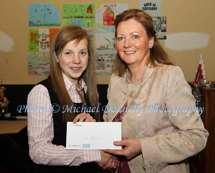 Inga Juozunaite, Mount St Michael Secondary School  is presented with her prize by  Norrie Walsh, Claremorris Credit Union, in the St Colman's (Claremorris) Credit Union Poster Competition 2011.  Photo: © Michael Donnelly