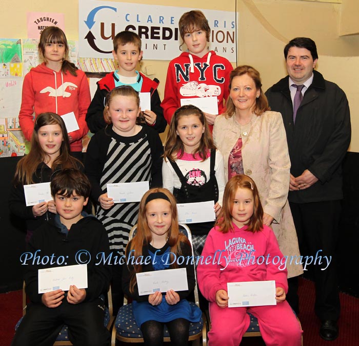 Winners of the Meelickmore NS section of the Claremorris Credit Union Poster competition 2011 front from left Category A: Michael John Duffy, 1st; Nicole Slattery, 2nd and Sophie Walton, 3rd;  Middle row Category B: Kirsten McHugh, 1st; Niamh Gildea , 2nd; and Chloe Keane 3rd; At back  category C:  Annemarie Kelly, 1st;  Caolan Walsh, 2nd and Diarmuid Staunton, 3rd and Norrie Walsh, Claremorris Credit Union, and Liam Horkan, Teacher; Photo: © Michael Donnelly Photography