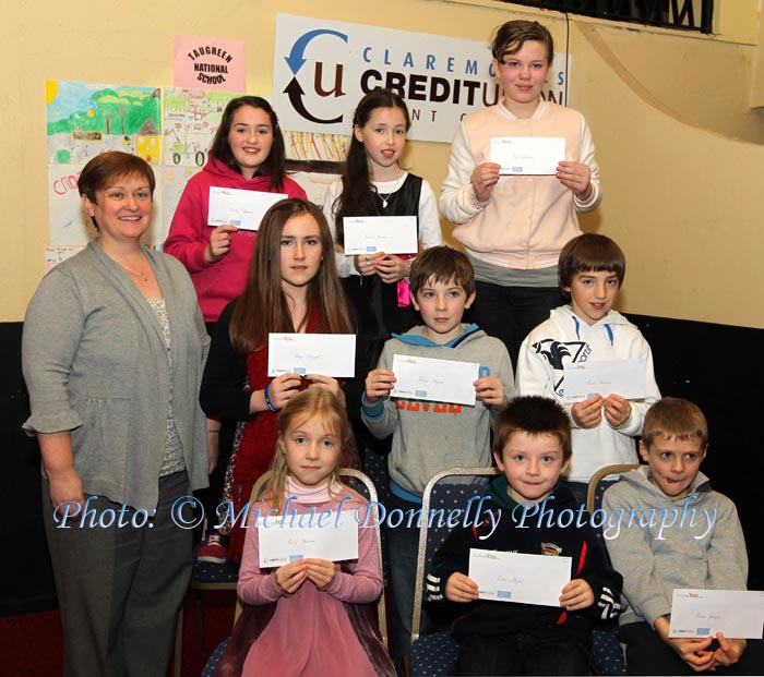 Winners of the Gortskehy NS section of the Claremorris Credit Union Poster competition 2011 front from left Category A: Amy Hession, 1st; Evan Flynn, 2nd and Adam Jepson, 3rd;  Middle row Category B: Amy Frizzel, 1st;  Thomas Higgins, 2nd; and Enda Hession, 3rd; At back with category C: Martina Gormley, Claremorris Credit Union , Nicola Hession, 1st; Rachel Hession, 2nd, and Orla Beddows, 3rd. Photo: © Michael Donnelly