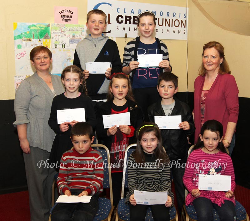 Winners of the Taugheen NS section of the Claremorris Credit Union Poster competition 2011 front from left Category A: Daragh Judge, 1st; Sioda Monaghan, 2nd and Aislish McCaffertey 3rd;  Middle row Category B: Louise King, 1st;  Grace Campbell, 2nd; and Nathan Moran, 3rd; At back with category C: Martina Gormley,  Claremorris Credit Union; Brian Campbell, 1st; and Ciara McNamara, 2nd, Thomas Morris (missing) was 3rd and Norrie Walsh Claremorris Credit Union. Photo: © Michael Donnelly Photography
 
