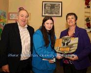 Shania McDonagh, Mount St Michael Secondary School, Claremorris, Overall winner of the St Colman's (Claremorris) Credit Union Poster Competition 2011 is presented with the Gerry Rynne Memorial Trophy by Gerry's daughter Mary Hanley, included in photo is Brendan Mellett, Claremorris Credit Union. Photo: © Michael Donnelly