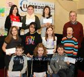 Winners of the Barnacarroll NS section of the Claremorris Credit Union Poster competition 2011 front from left Category A: TJ O'Brien, 1st; Caoimhe Colgan, 2nd and Cathal Bermingham, 3rd;  Middle row Category B: Zoe Jennings, 1st;  Louise Reaney, 2nd; and Niamh Joyce, 3rd; At back  category C: Sinead O'Brien, 1st; Ciara Flatley, 2nd, and Niamh Lusson, 3rd and Seamus Connaughton, Claremorris Credit Union. Photo: © Michael Donnelly