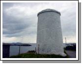 White towers mark the harbour entrance.