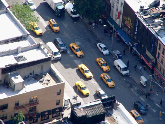 Yellow Cabs Below - probably on Broadway.
