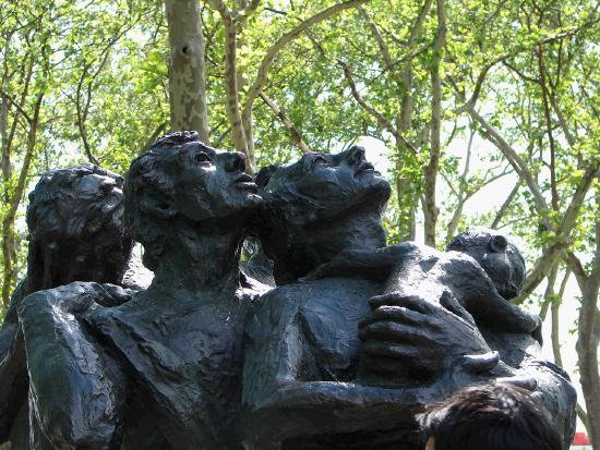 A statue in Battery Park representing immigrants to the USA.