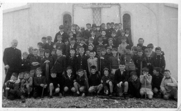 The second picture is of the whole group on top of a mist shrouded Croagh Patrick taken by Bro. John. This group is from the two fourth classes and fifth class in St. Patricks NS who climbed Croagh Patrick. There were about 70 students in all and they were accompanied by Fr Charle O'Malley (RIP), Fr. Tom Shannon and Brother John.