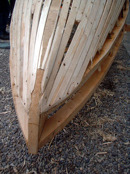   http://www.castlebar.ie/photos/pj/currach6/bowdetail1.jpg              