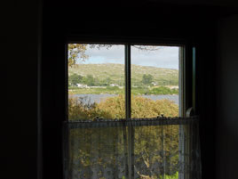 looking out the window of Pearses Cottage